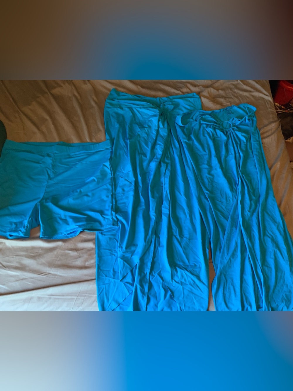 SKIMS Swimwear Bright Turquoise- shorts, swim skirt, and sarong